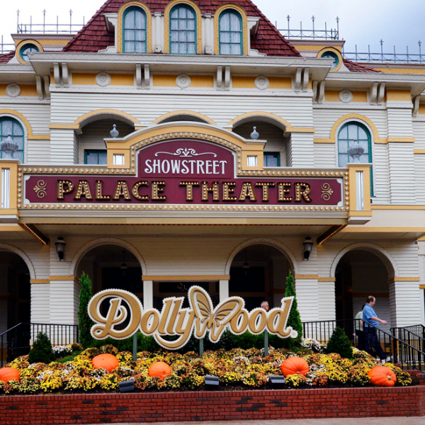 Showstreet Palace Theater with the Dollywood sign and autumn pumpkin display at Dollywood theme park in Pigeon Forge, Tennessee