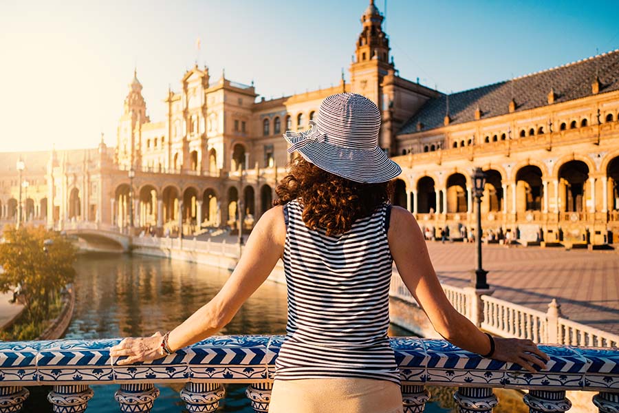 Ornate tiled courtyard and arches of the Plaza de España in Seville